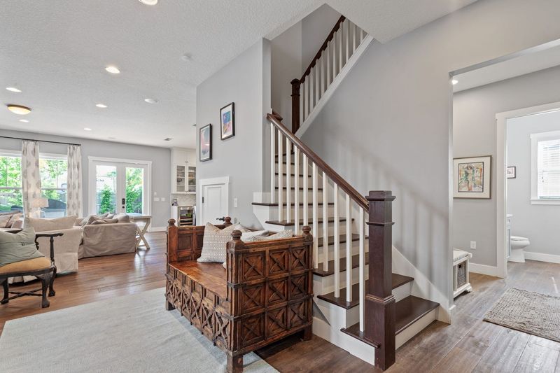 Bright, freshly cleaned home interior with staircase